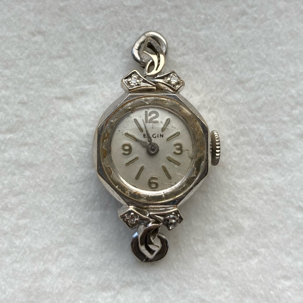 Vintage 14k gold Elgin watch with diamond accents